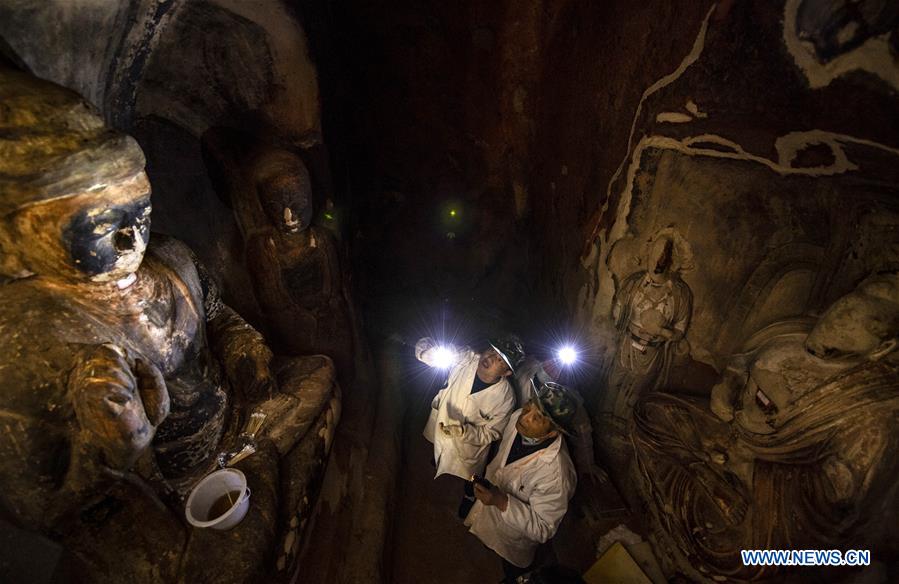 CHINA-NINGXIA-GUYUAN-XUMISHAN GROTTOES-MURALS-RESTORATION (CN)