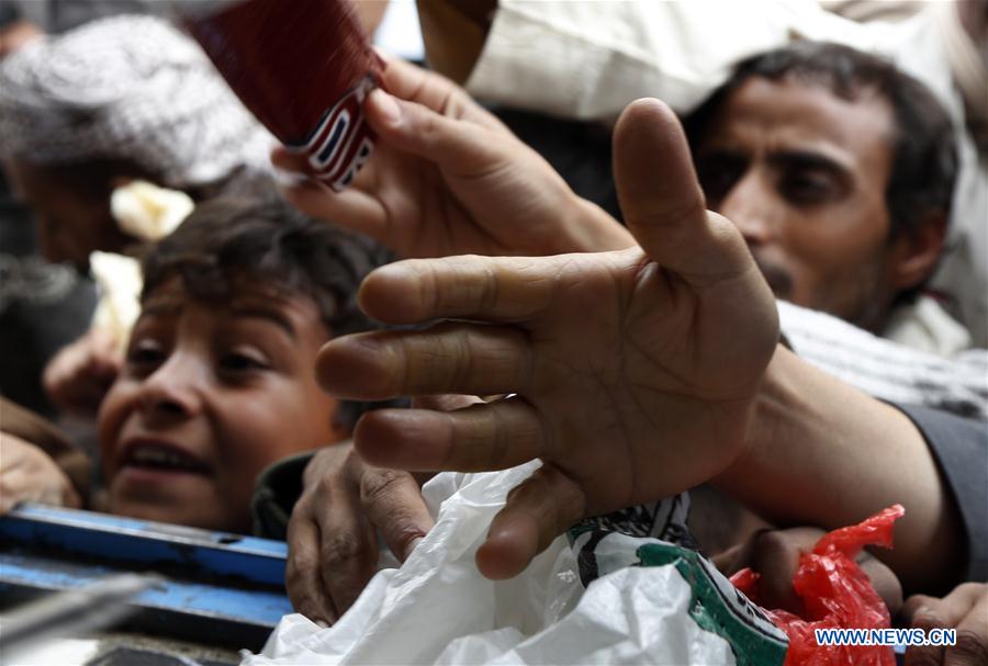 YEMEN-SANAA-WAR-BREAD DISTRIBUTION