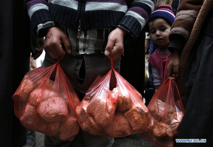 YEMEN-SANAA-WAR-BREAD DISTRIBUTION