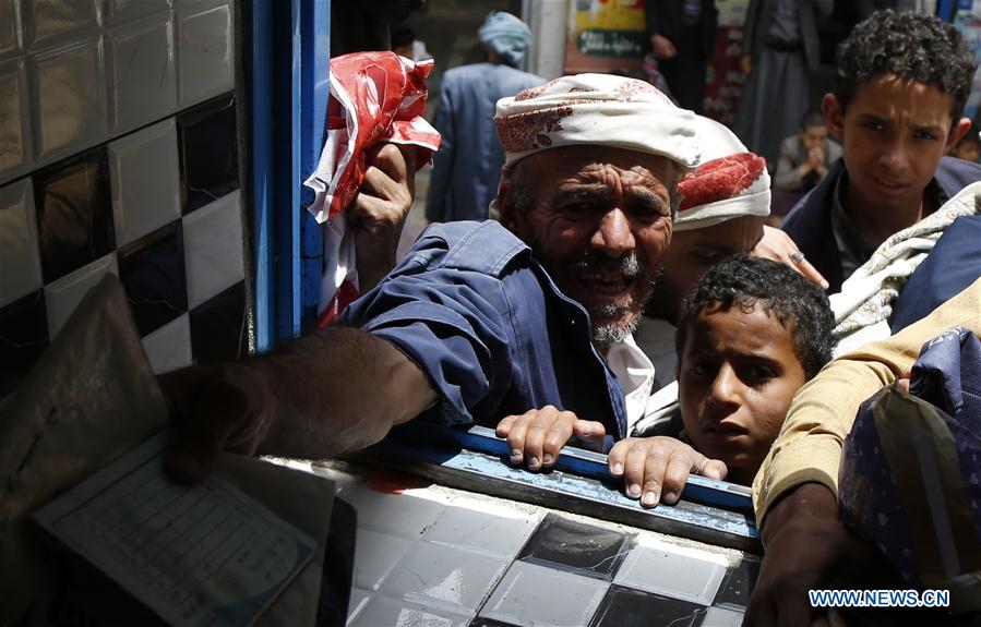 YEMEN-SANAA-WAR-BREAD DISTRIBUTION