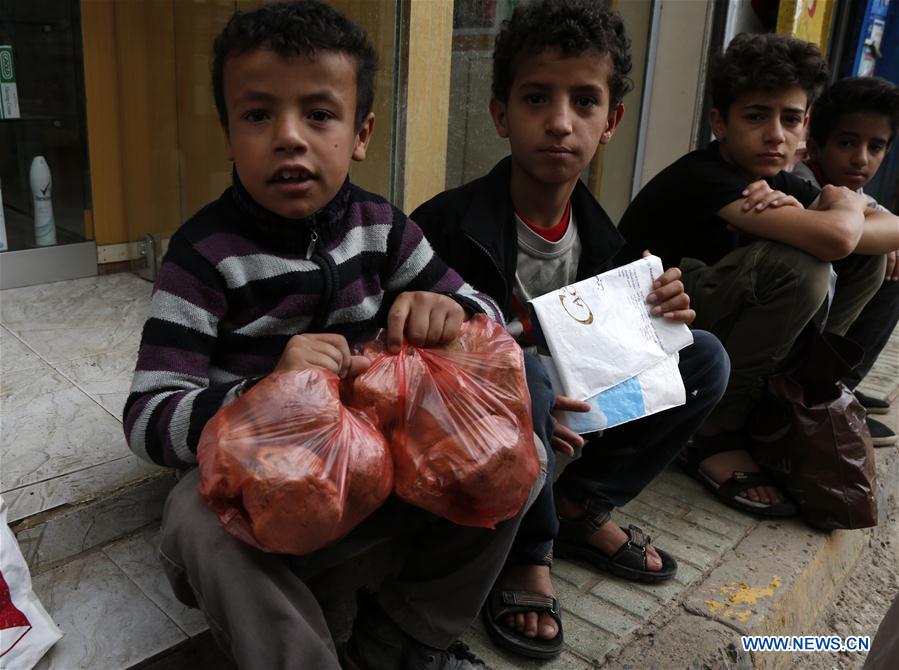 YEMEN-SANAA-WAR-BREAD DISTRIBUTION