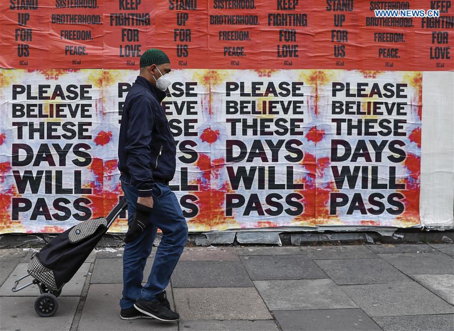 BRITAIN-LONDON-COVID-19-POSTER