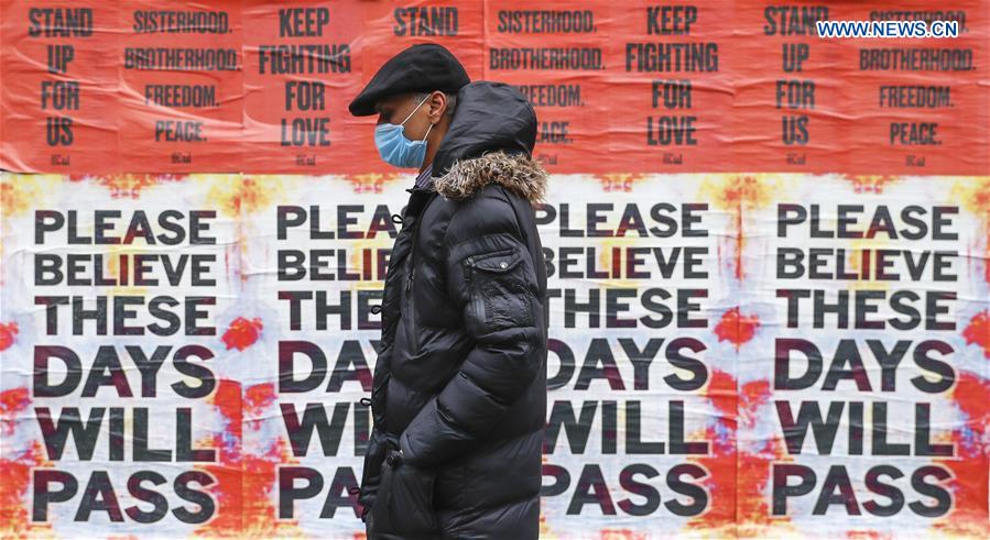 BRITAIN-LONDON-COVID-19-POSTER