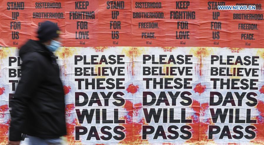 BRITAIN-LONDON-COVID-19-POSTER