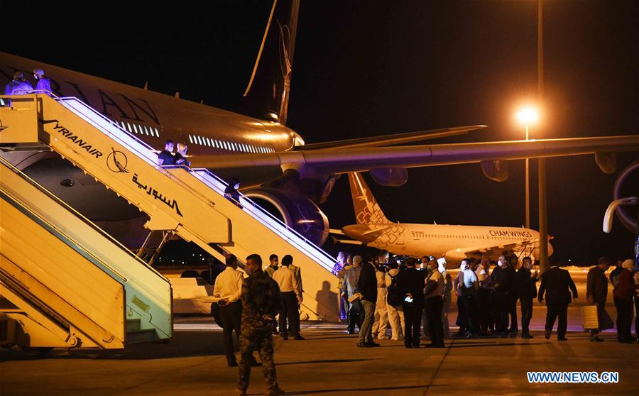 SYRIA-DAMASCUS-UAE-COVID-19-SYRIANS-RETURN