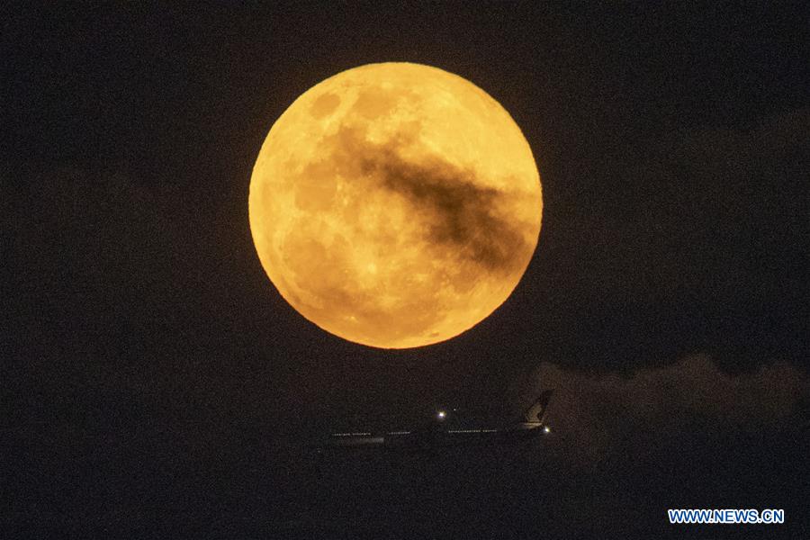 Full moon seen in sky Xinhua English.news.cn
