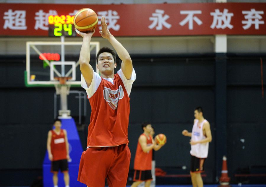 Chinese basketball player Yi Jianlian takes part in a training