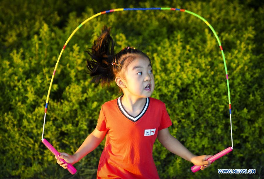 In pics rope jumping world champion and his daughter Xinhua