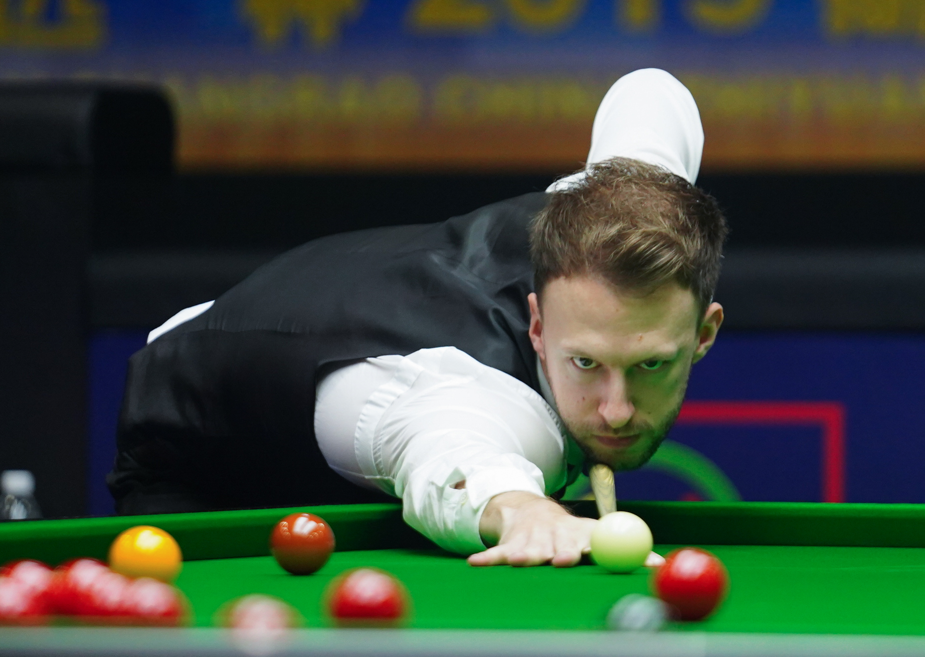 Defending champion Trump edges through first at Snooker World Championship | English.news.cn