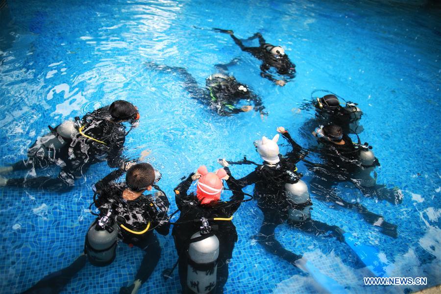 Trainees learn scuba diving in club in China's Guizhou Xinhua