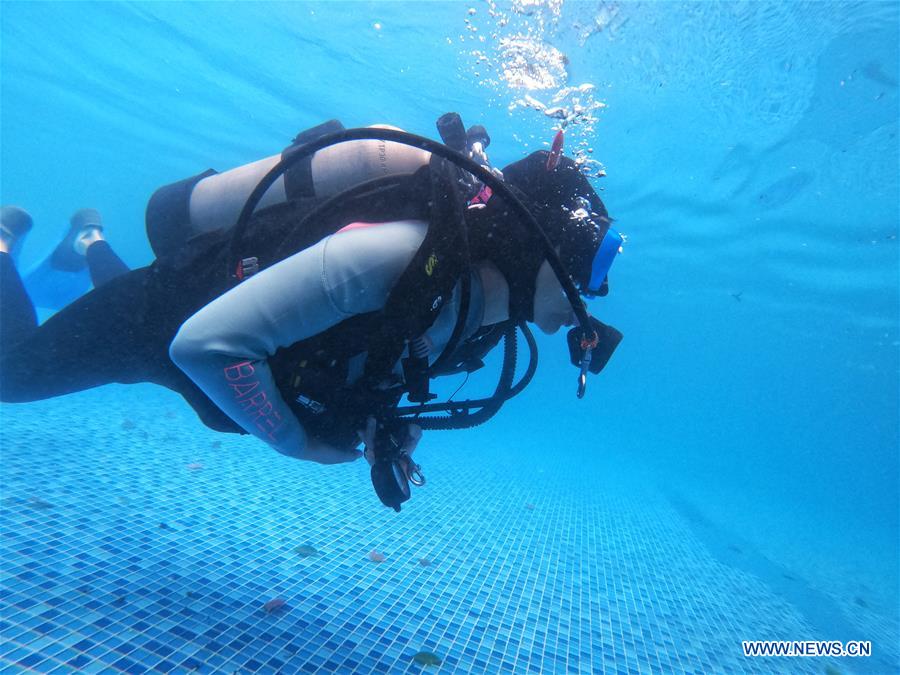 Trainees learn scuba diving in club in China's Guizhou Xinhua