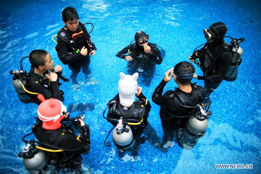Trainees learn scuba diving in club in China's Guizhou Xinhua