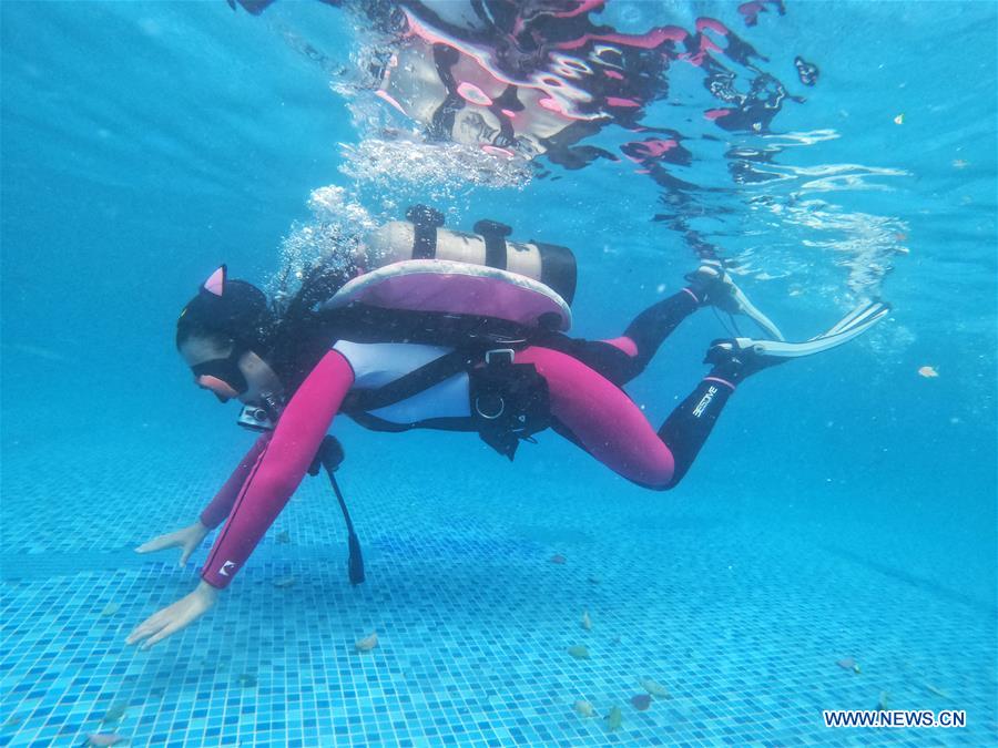 Trainees learn scuba diving in club in China's Guizhou Xinhua