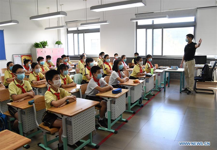 Primary, middle schools kick off new school year across China Xinhua