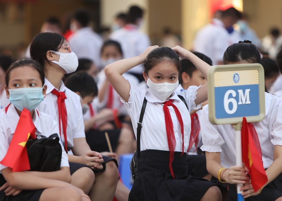 Students in Vietnam head back to school with COVID19 precautions
