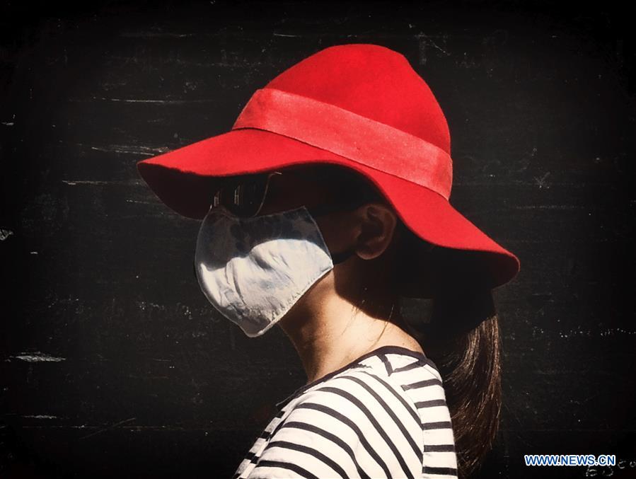 People wear face masks in France Xinhua English.news.cn