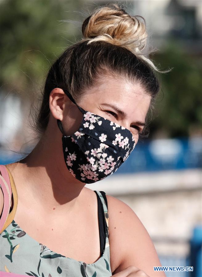 People wear face masks in France Xinhua English.news.cn