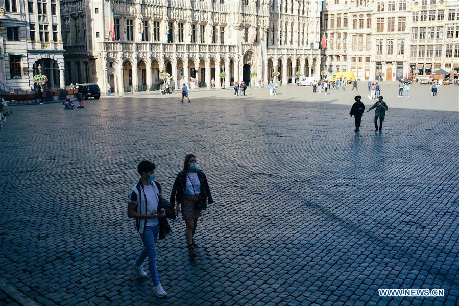 People wear face masks in Brussels, Belgium Xinhua English.news.cn