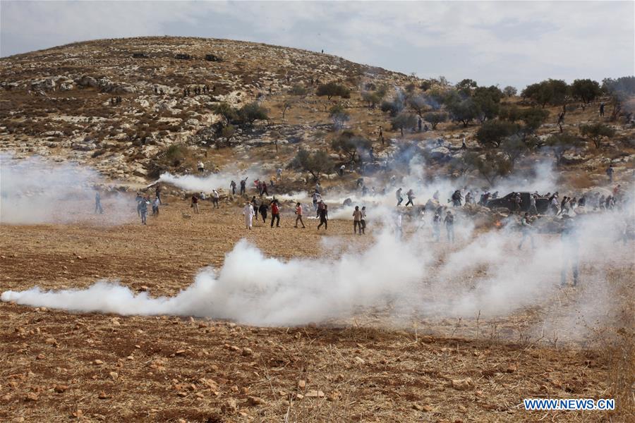 Palestinian protesters clash with Israeli soldiers in West Bank village of Beit Dajan