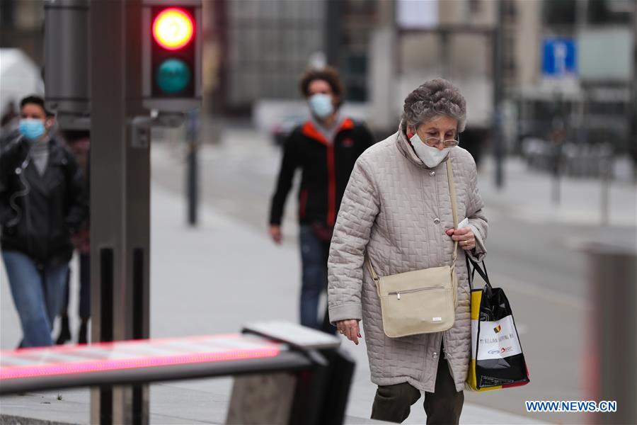 People wear masks in Brussels, Belgium Xinhua English.news.cn