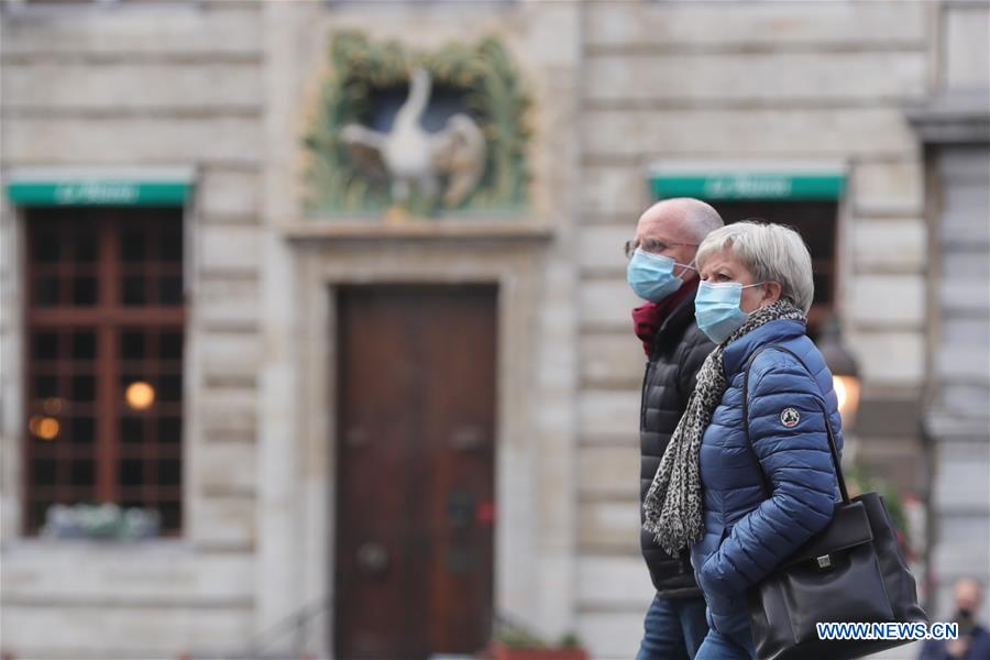 People wear masks in Brussels, Belgium Xinhua English.news.cn