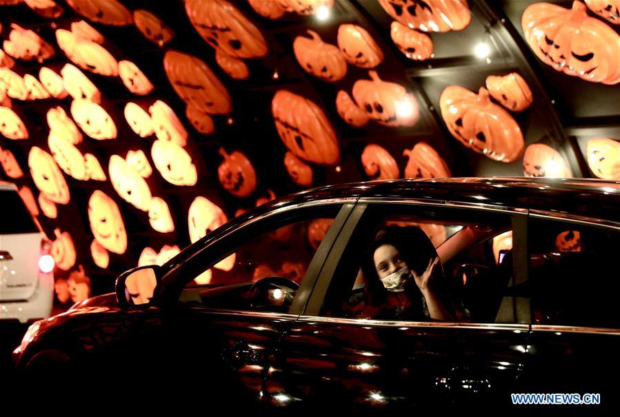 Visitors take part in HAUNTOWEEN LA in Los Angeles, U.S. Xinhua