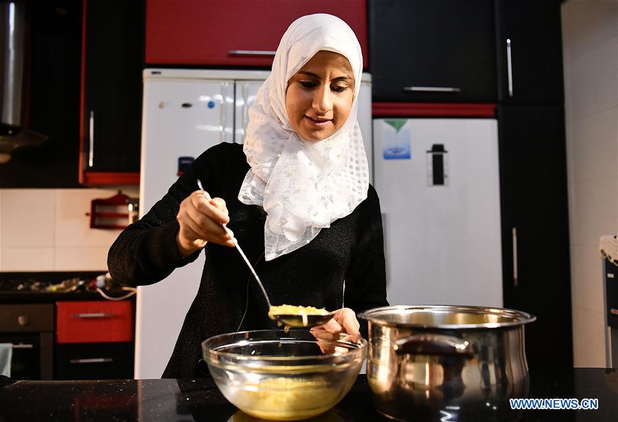 SYRIA-DAMASCUS-DEAF WOMAN-COOKING-BROADCAST