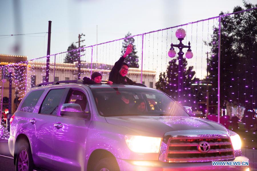 People visit Christmasthemed drivethru light show in San Jose