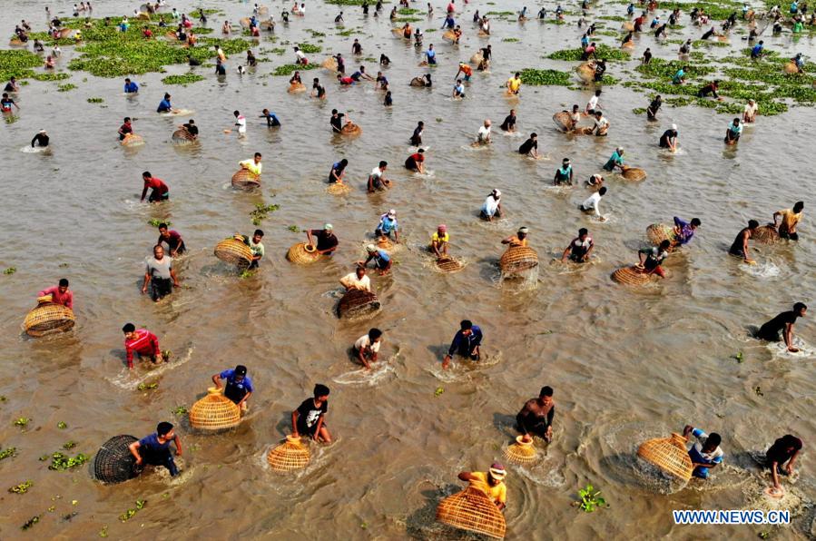 Highlights of fish hunting festival in Sylhet, Bangladesh - Xinhua