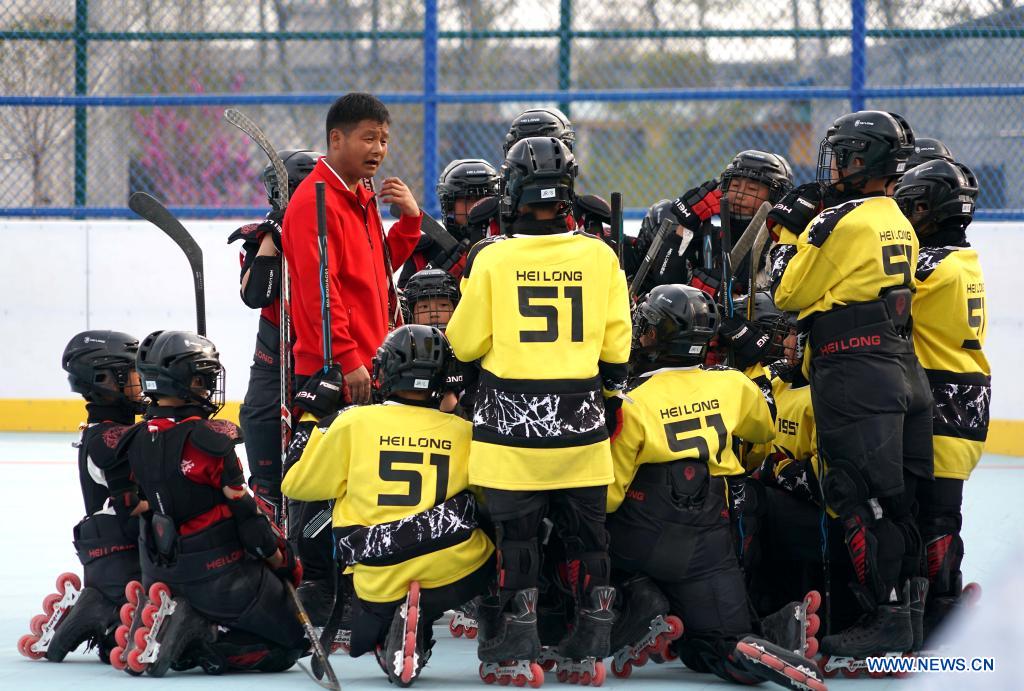 China's martial arts school builds ice hockey team Xinhua English