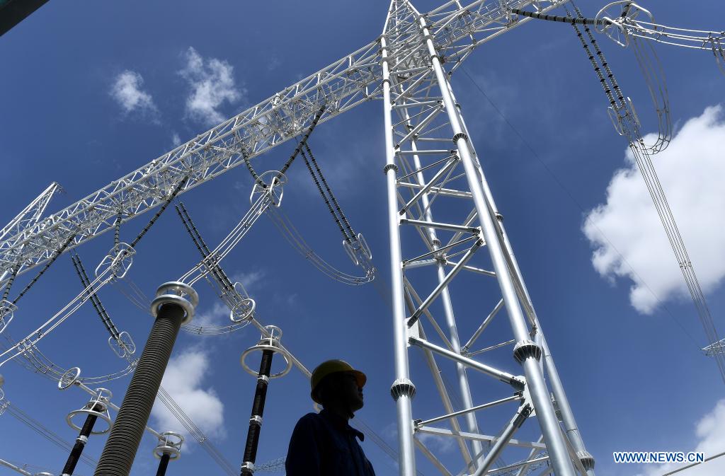 In pics ultrahigh voltage transmission line from Qinghai to Henan