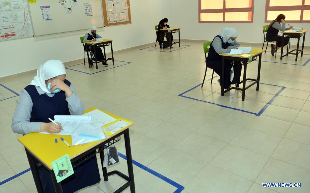 Kuwaiti Grade12 students sit exams at school with strict COVID19