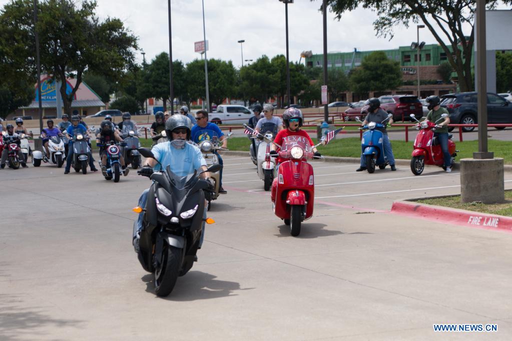 Vespa parade held in Plano, U.S. Xinhua English.news.cn