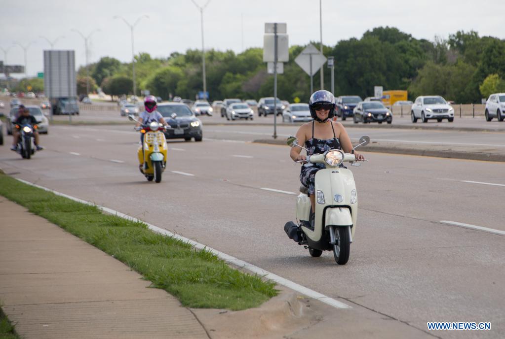 Vespa parade held in Plano, U.S. Xinhua English.news.cn