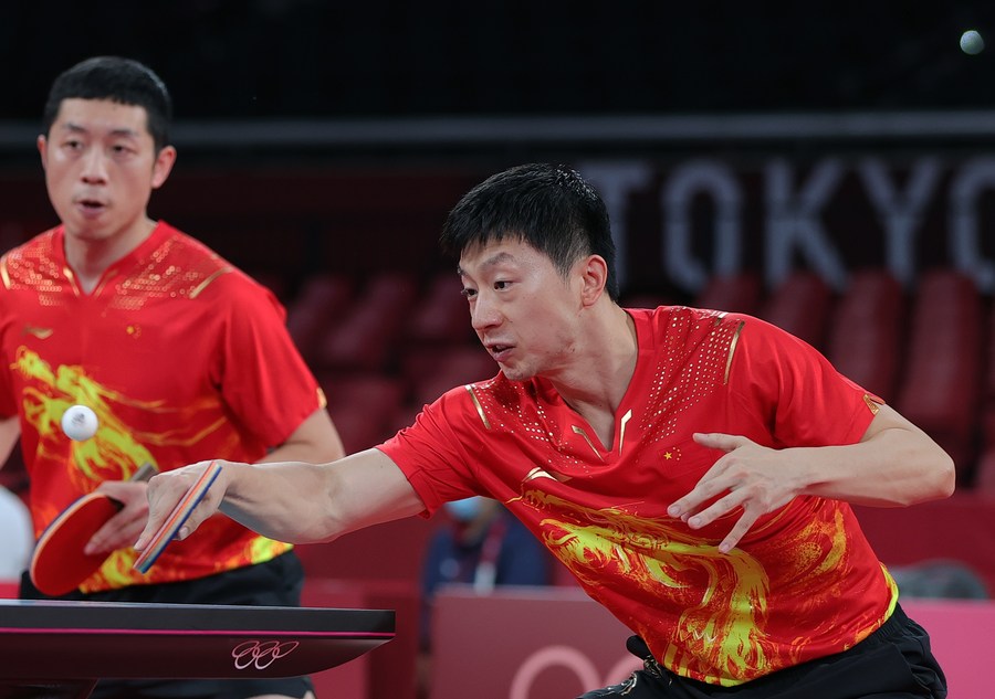 Chinese paddlers make men's, women's team events quarterfinals at