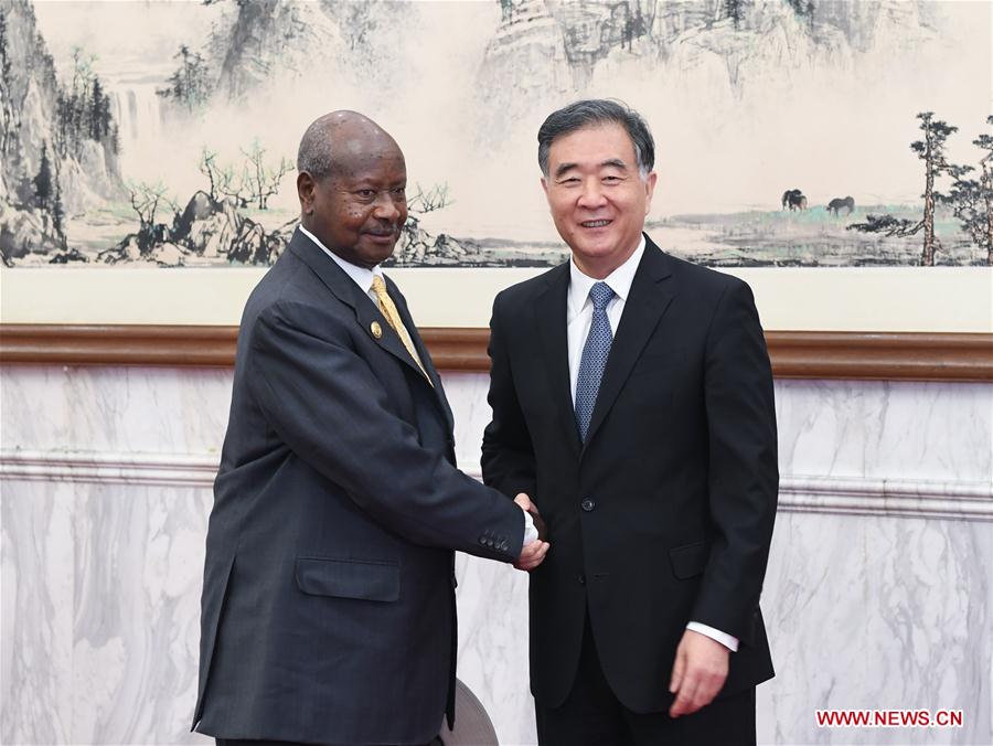 CHINA-BEIJING-WANG YANG-UGANDAN PRESIDENT-MEETING (CN)