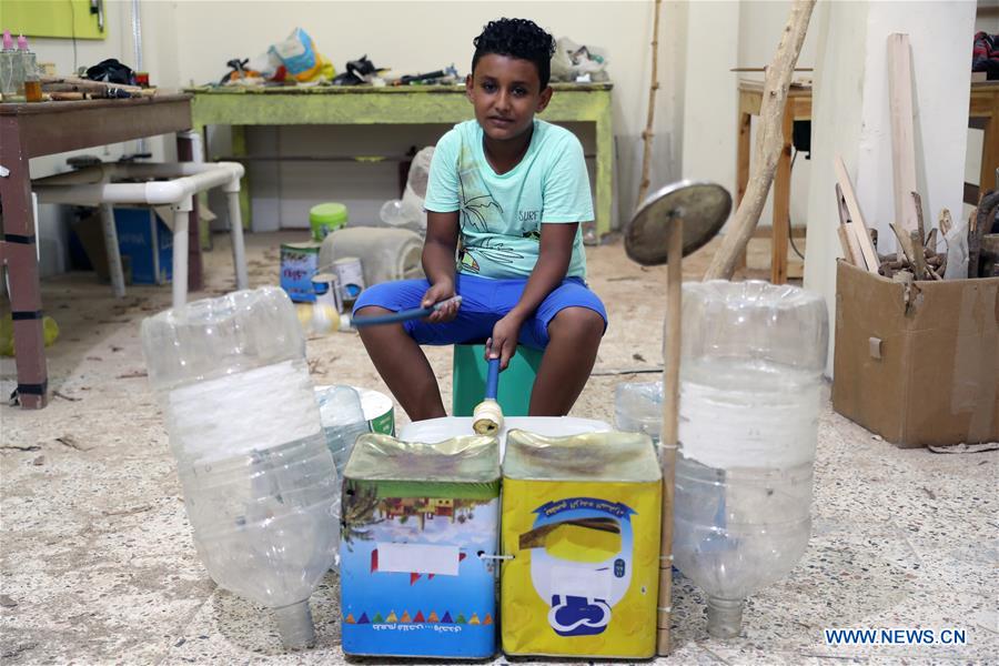 EGYPT- LUXOR-GARBAGE INTO MUSICAL INSTRUMENTS