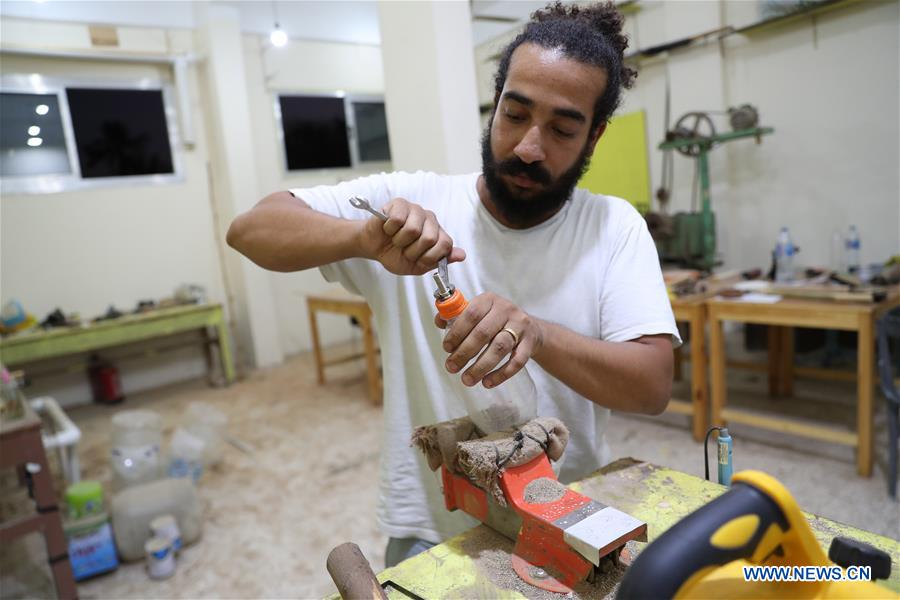 EGYPT- LUXOR-GARBAGE INTO MUSICAL INSTRUMENTS