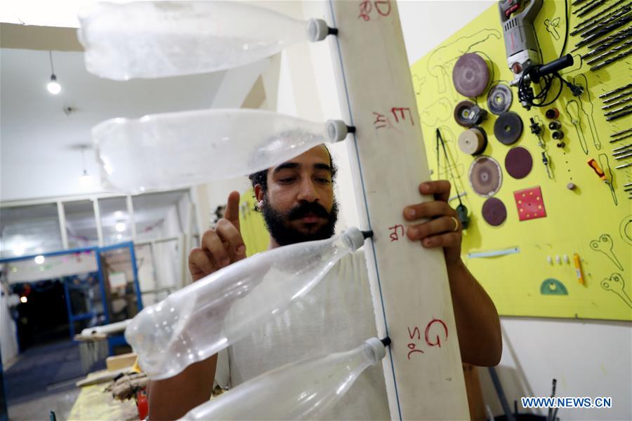 EGYPT- LUXOR-GARBAGE INTO MUSICAL INSTRUMENTS