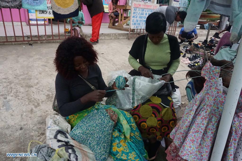 Feature Zambian secondhand clothes resellers adding value to used