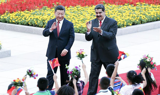 Xi, Maduro agree to promote bilateral ties to higher level