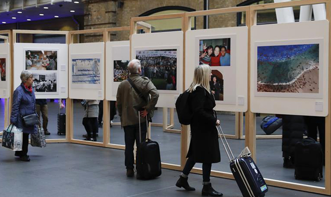 Photo exhibition in London to mark 40 years of China's reform, opening up