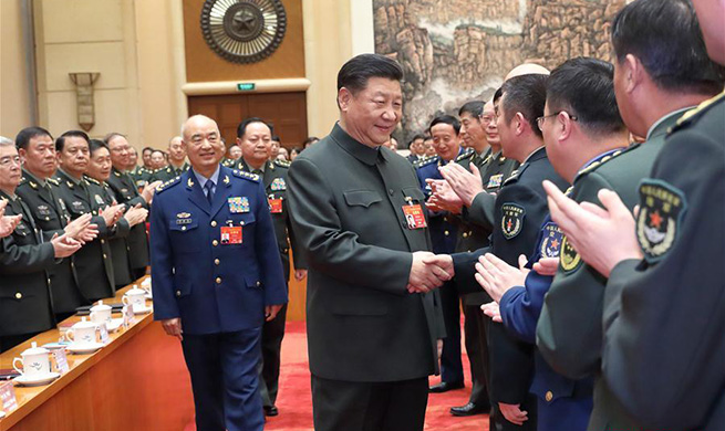 Xi attends plenary meeting of delegation of PLA, armed police