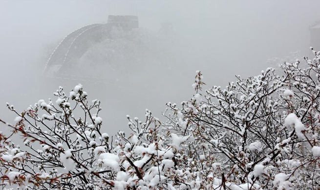 Beijing greets snow in April