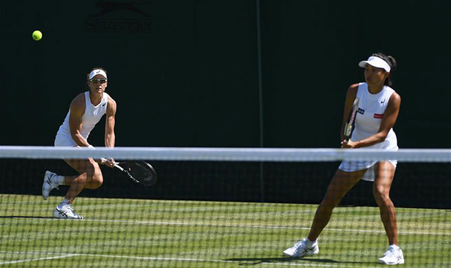 Zhang Shuai/Samantha Stosur into next round of women's doubles at Wimbledon