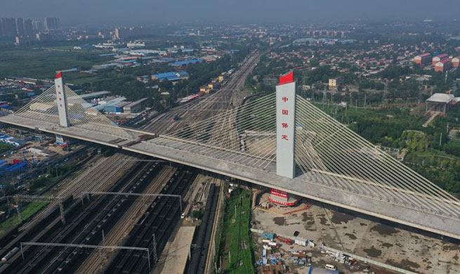 China's new architectural wonder: a 46,000-tonne bridge rotates successfully