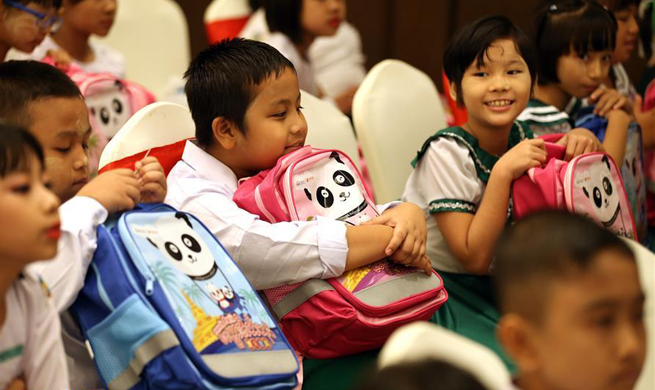 China donates school bags, stationeries to Myanmar students