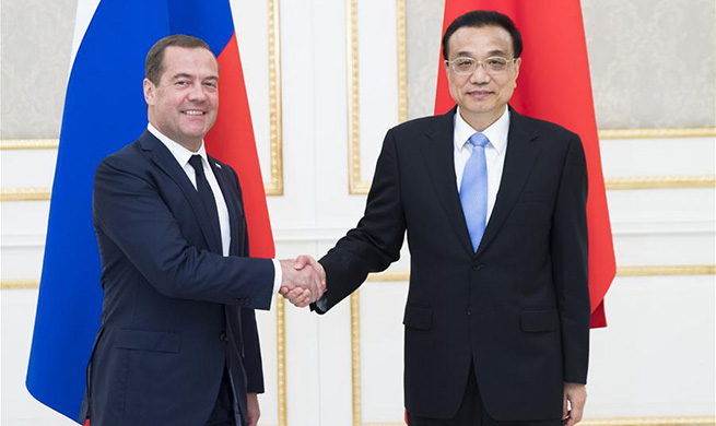 Chinese premier meets Russian PM on SCO, bilateral cooperation