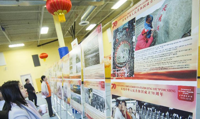 Photo exhibition marking 70th anniversary of PRC's founding held in Canada