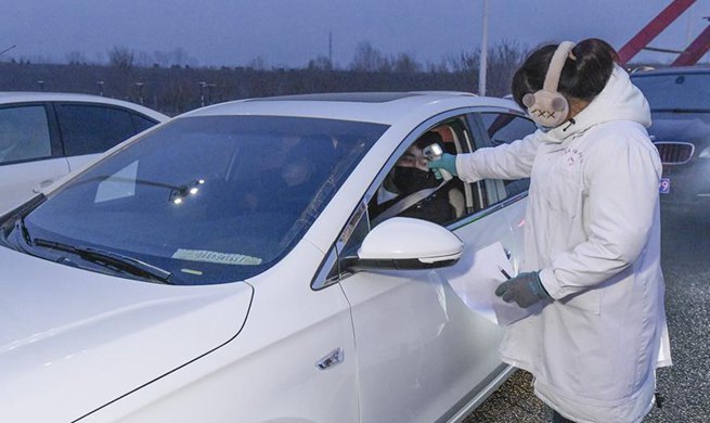 Zunhua sets up checkpoints at highway exits to measure body temperature